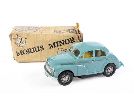 A Victory Industries (Surrey) Ltd battery powered plastic Morris Minor saloon, leaflet and box  Car in good condition, untrie