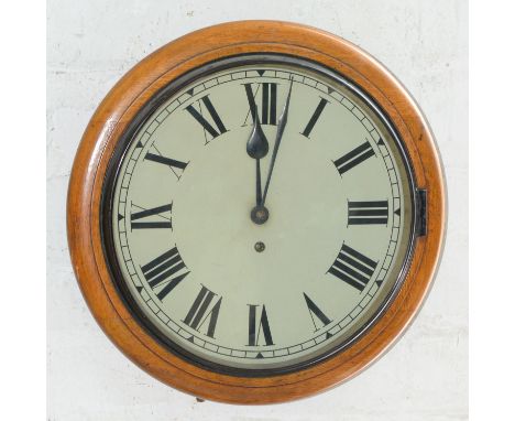 A light oak wall timepiece, c1900, with painted dial and simple barrel movement, pendulum, 38cm diam  Side door detached