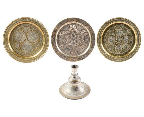 Three brass 'Cairo ware' dishes and a Turkish tinned brass huqqa base, first half 20th c, various sizes (4)  Light wear, huqq