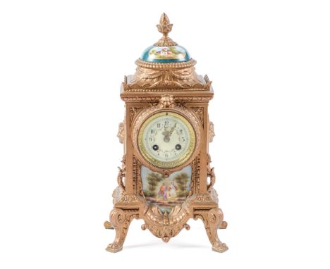 A French porcelain mounted spelter gilt mantel clock, the primrose enamel dial decorated with swags, having gong striking mov