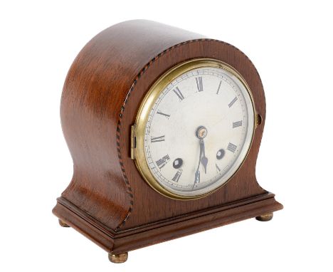 A mahogany and broken line inlaid mantel clock, early 20th c, the silvered dial inscribed MADE IN ENGLAND, having blued steel