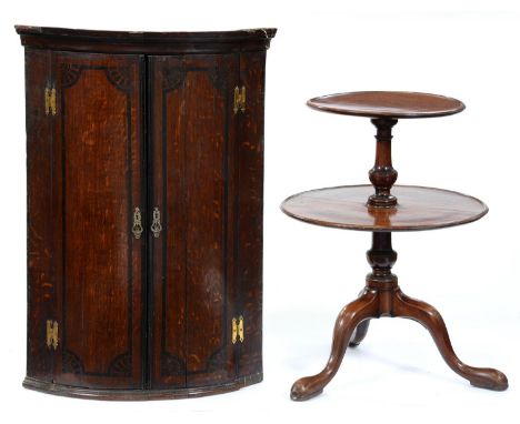 A George III mahogany dumb waiter, of two graduated dished tiers with knopped shaft on tripod, 80cm h and a 19th c bow fronte