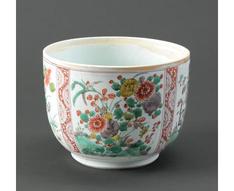A Chinese famille verte bowl, Qing dynasty, 19th c,&nbsp; painted with four panels of flowering plants, 16cm h, underglaze bl