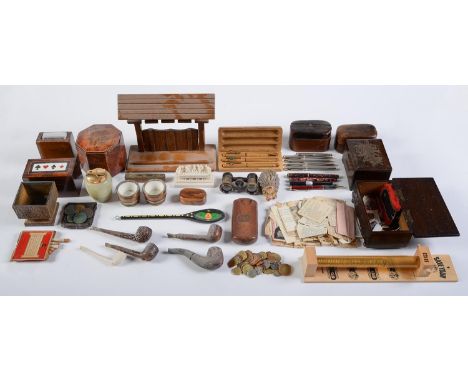 An octagonal amboyna and line inlaid tea caddy, two playing card boxes and miscellaneous other wooden boxes and bygones, 19th