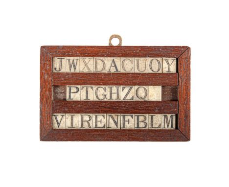 A Regency mahogany framed part set of bone letters of the alphabet,&nbsp; 95 x 150mm  Natural accretion of dust and dirt; lig