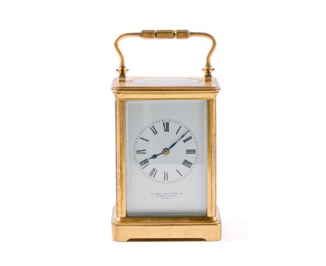 A French brass carriage clock, H W Bedford and Compy Ltd 105 Regent Street London, early 20th c, with enamel dial, gong strik