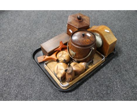 A tray of wooden tea caddy and biscuit barrel, inlaid mantel clock, wooden cat ornaments etc 