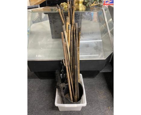 A box of chimney sweep brush and rods, three piece companion set on stand, matching coal bucket 