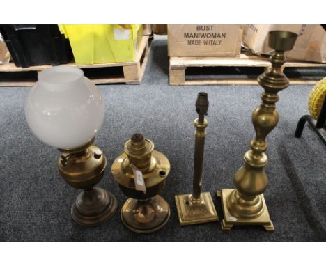 An antique brass Duplex oil lamp with glass chimney and shade together with a further Aladdin oil lamp base and two brass lam