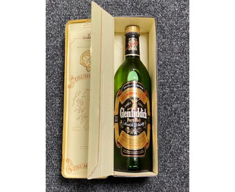 A bottle of Glenfiddich Malt Scotch Whisky Special Old Reserve 750ml in presentation tin