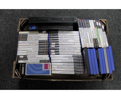 A box of Play Station 2 console, controller pack and large quantity of assorted games 