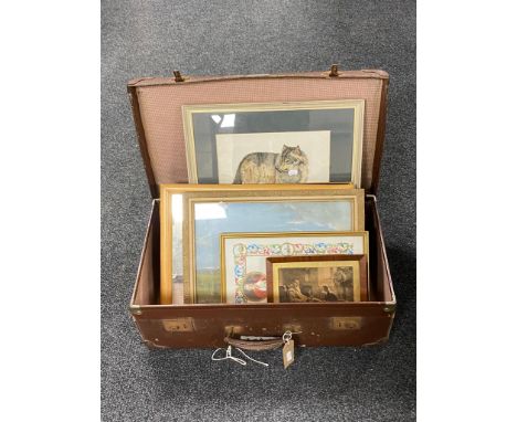 A vintage luggage case containing pictures and prints including a Diana Farrier picture of a wolf, pine mirror etc 
