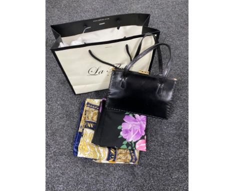 A box of vintage scarves and leather handbag 