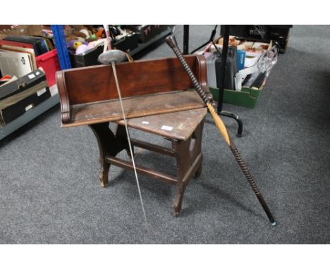 An antique pine cracket together with a mahogany wall shelf, fencing foil and tribal stick