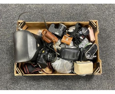 A box of vintage cameras Olympus, Canon, Minolta etc 