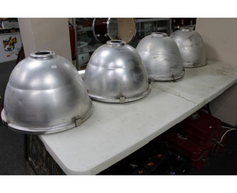 Four mid century aluminium halogen light shades 