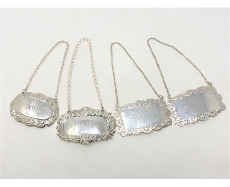 Three silver Sherry decanter labels and a silver Port label (4)