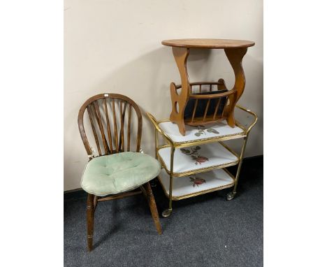 A Windsor kitchen dining chair together with a gilt three tier serving trolley and a magazine table 