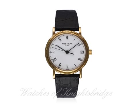 A FINE GENTLEMAN'S 18K SOLID GOLD PATEK PHILIPPE CALATRAVA AUTOMATIC WRIST WATCH CIRCA 1990s, REF. 3802/200  D: Porcelain dia