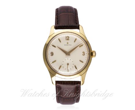 A RARE GENTLEMAN'S 18K SOLID GOLD ZENITH STÖTSÄKRAD WRIST WATCH CIRCA 1960 D: Silver dial with gilt batons & Arabic numerals,