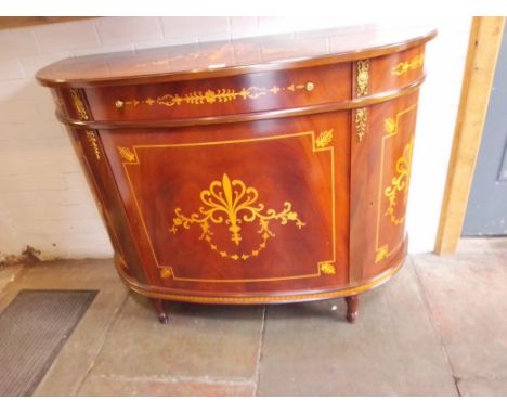 A reproduction French style demi-lune cabinet, inlaid and gilt metal mounted, width 125cm, depth 48cm &amp; height 96cm.&nbsp