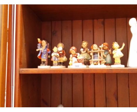 8 Hummel figures including ‘Chick Girl’ (1950-55), ‘Sign of Spring’ (1960-63) & Hear ye, hear ye (1960-72) and some Collector
