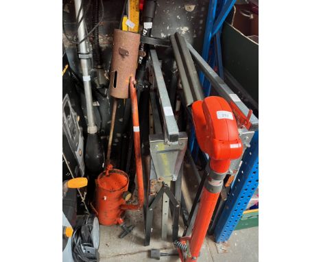 A pair of saw benches, flame thrower, bicycle stand, window cleaner, Flymo hedge trimmer, spirit levels, etc. 