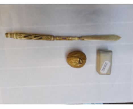 A mixed lot of collectables comprising carved bone pen/letter opener, miniature harmonica and a tape measure modelled as a wa