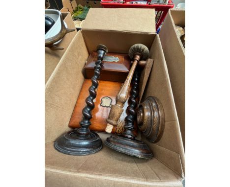 A box of treen to include a cat door stop, tea caddy, 2 barley twist candlesticks and a letter writing box. 