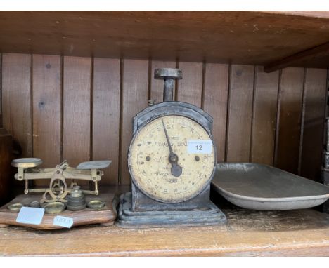A vintage Hughes family scale with tray, by Salter and a small set of postal scales with weights. 