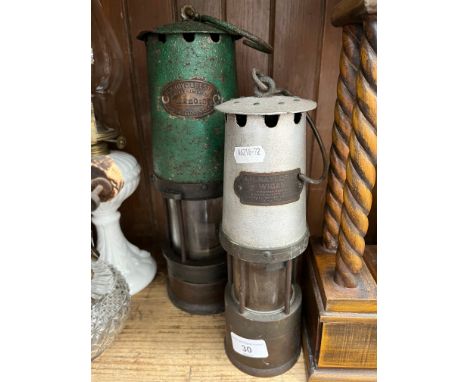 A vintage Ackroyd &amp; Best Ltd miner's lamp together with a J.H Naylor Ltd miner's lamp. 