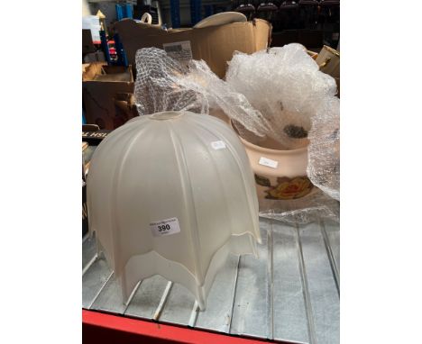A pair of Art Deco style light shades and a ceiling light fitting. 