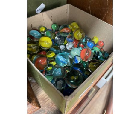 A box of vintage marbles. 