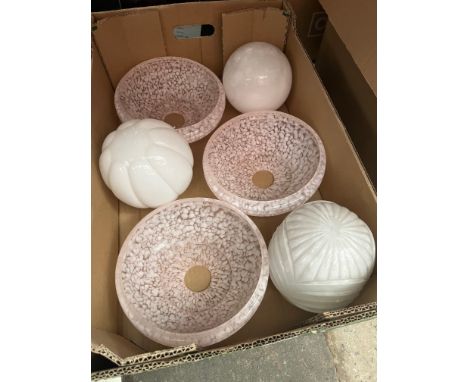 A box of vintage glass light shades. 