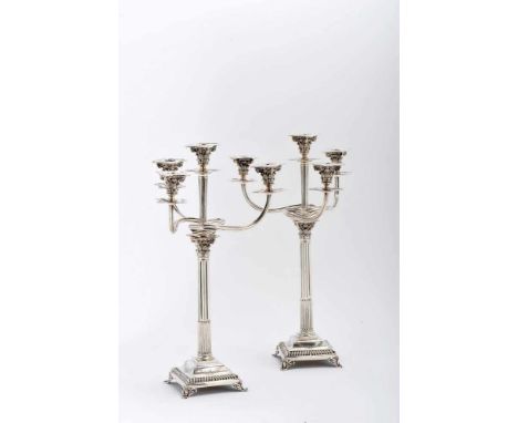A Pair of Four-light Candelabra, neoclassical style, 833/1000 silver, gadrooned and engraved decoration, Portuguese, signs of