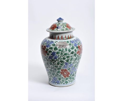 A Covered Pot, Chinese porcelain, Wucai decoration "Flowers", Kangxi period (1662-1722), restoration on the neck, faults on t