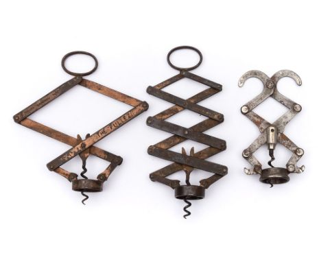 A Wier's patent lazy tongs corkscrew by James Heeley & Sons:, together with two other lazy tongs pattern corkscrews (3) 