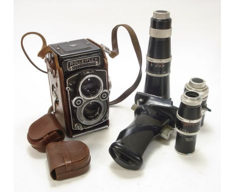 A Rolleiflex 3.5F twin reflex camera, number 2295488:, with Carl Zeiss planer 1:3.5 f=75mm lens, together with a Rolleiflex t