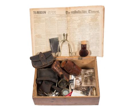 A collection of WWI  British Officer's mess kit:, including a leather housewife, a leather cased travel clock, two pairs of s