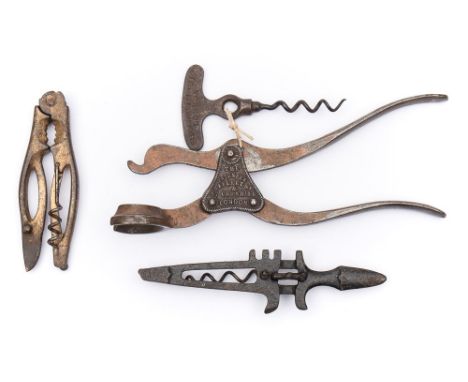 A late 19th century two-piece lever action corkscrew by Lund, London:, signed as per title to mounting plate with patentee ad