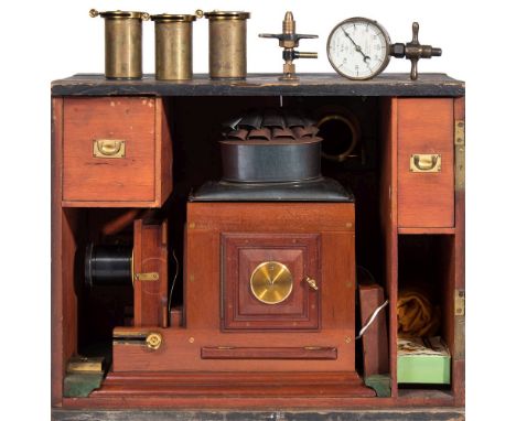 A late 19th century mahogany and brass magic lantern:, unsigned, with Russian lacquer chimney, fitted later electrical bulb b