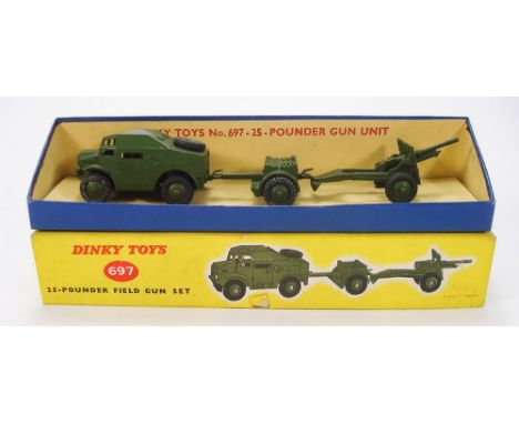 Dinky No 697 Military Field Gun set:, Quad tractor, ammunition trailer and field gun in green with black treaded tyres, paint