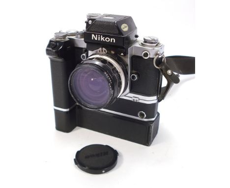 A Nikon F2 Photomic SLR 35mm body number 7178411:, with 35mm lens, MD-1 Motor drive and MB-1 battery pack, also fitted lightm