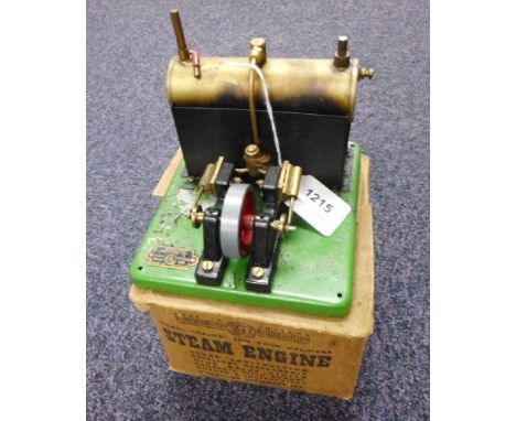 A live steam 'Model Major 1550' Twin cylinder steam engine by SEL, (Signalling Equipment Ltd):, gilt and black on a green bas