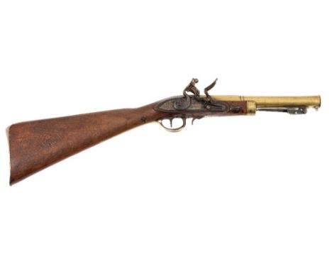 An 18th century brass barrel blunderbuss by Ketland & Co:, the 10 1/2 inch two stage barrel with spring loaded bayonet beneat