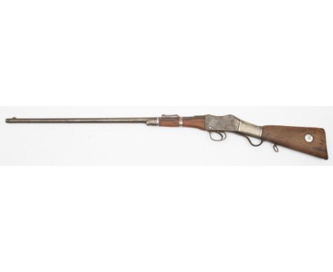 An Omani white metal mounted Martini Henry action sporting gun,: the 28 /14 inch barrel with ladder sight, with white metal g