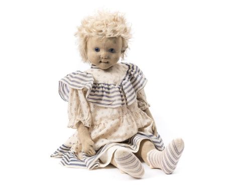 An early 20th century Steiff doll, circa 1910:, blonde hair over felt head with central seam, blue glass eyes, stitched nose 