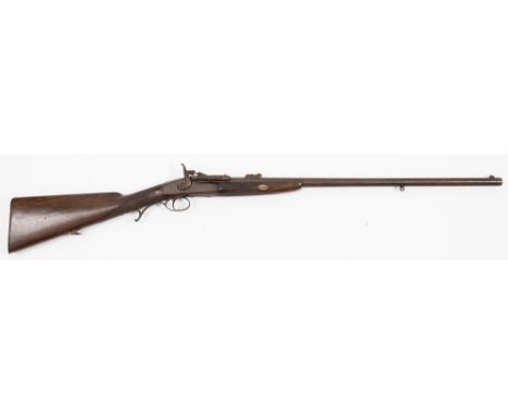 A late 19th/early 20th century Schneider conversion breech loading sporting gun:, 26 3/4 inch barrel with fore and rear ladde
