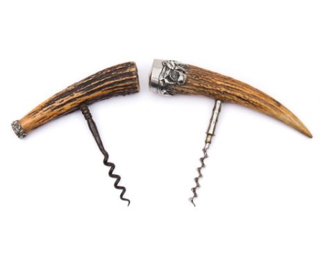 An early 20th century white metal mounted antler handled corkscrew:, with monogrammed cartouche, 15cm high and one other simi