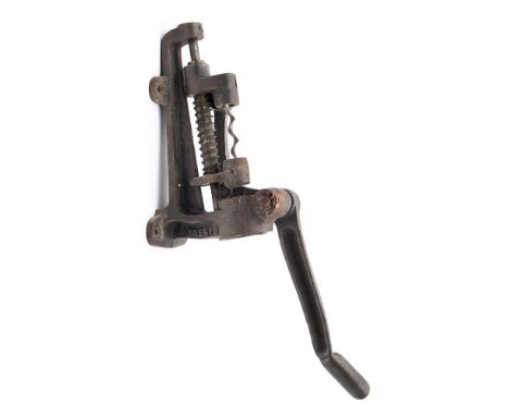 A French cast iron wall mounted 'Presto' bar corkscrew:, with single lever action, 31cm high.